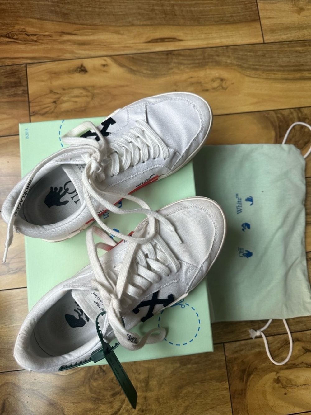 Off-White White Sneakers with Black Arrow Accent